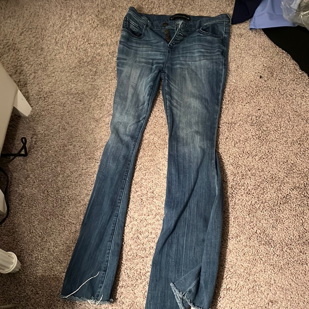 High waisted bell bottom blue jeans